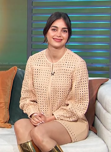 Melissa Barrera’s beige eyelet leather jacket and skirt on Access Hollywood