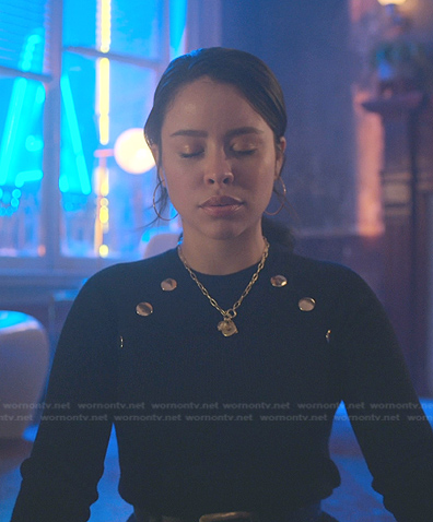 Mariana's black ribbed sweater with gold buttons on Good Trouble