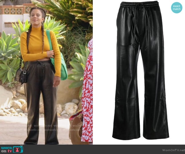 Nanushka faux-leather high-waist trousers worn by Fay (Grasie Mercedes) on Grand Crew