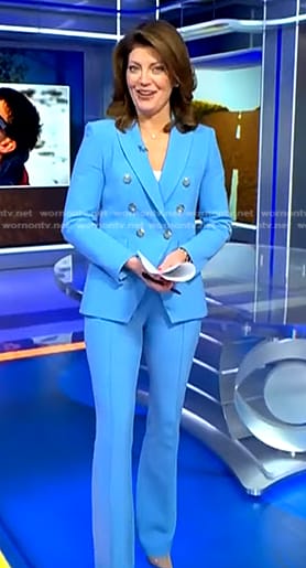 Norah’s blue double breasted blazer and pants on CBS Evening News