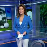 Norah’s blue double breasted blazer and white pants on CBS Evening News