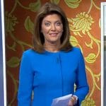 Norah’s blue peplum jacket and skirt on CBS Evening News