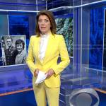 Norah’s yellow pant suit on CBS Evening News