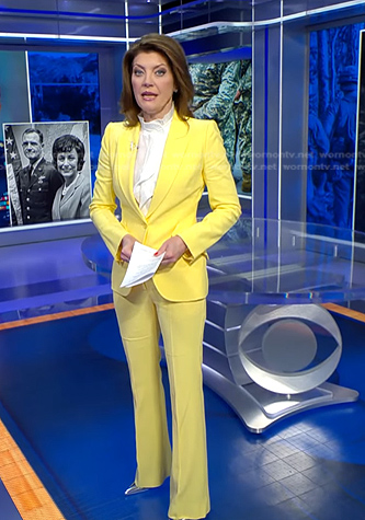 Norah’s yellow pant suit on CBS Evening News