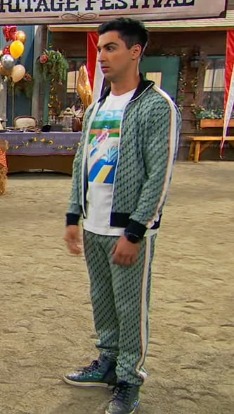 Parker's graphic print tee and green geometric track jacket on Bunkd