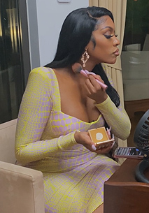 Porsha's yellow crocodile print top and skirt on The Real Housewives Ultimate Girls Trip