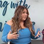 Remi Cruz’s blue off shoulder top on Access Hollywood