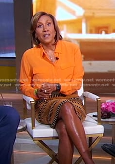 Robin's orange blouse and brown striped skirt on Good Morning America