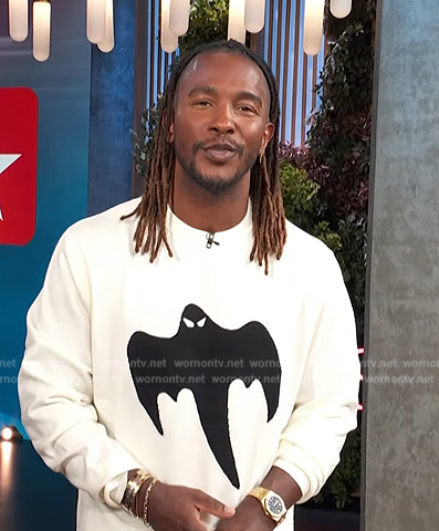 Scott’s white ghost print sweater on Access Hollywood