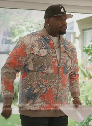 Sherm's abstract print jacket on Grand Crew