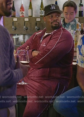 Sherm's burgundy tracksuit on Grand Crew