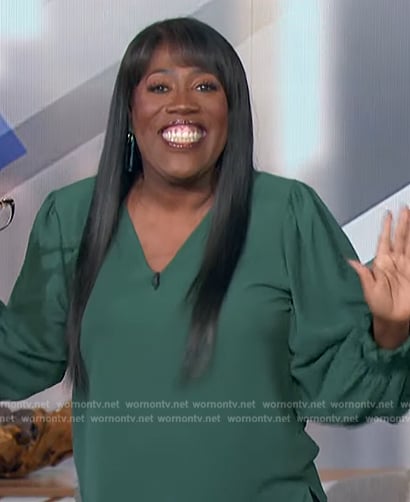 Sheryl’s green smocked cuff top on The Talk