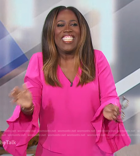 Sheryl’s pink flutter sleeve blouse on The Talk