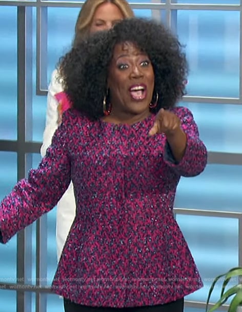 Sheryl’s pink jacquard peplum top on The Talk