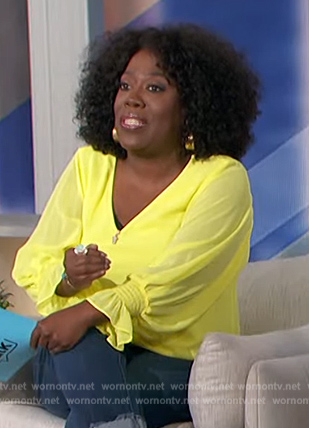 Sheryl’s yellow smocked cuff blouse on The Talk