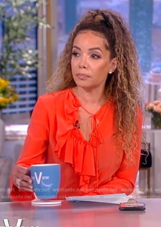 Sunny's orange ruffle blouse on The View