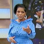 Tamron’s blue ruffle off shoulder top on Tamron Hall Show