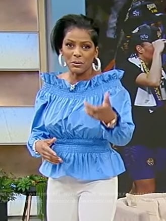 Tamron's blue ruffle off shoulder top on Tamron Hall Show