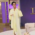 Tamron’s yellow tie neck asymmetric dress on Tamron Hall Show