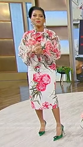 Tamron’s white floral print blouse and skirt on Tamron Hall Show