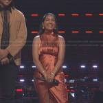 Tasha Jessen’s orange mock neck satin dress on The Voice