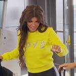 Teresa’s yellow love embellished sweatshirt on The Real Housewives of New Jersey