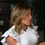 Kit’s white ruffle sleeve top on Access Hollywood