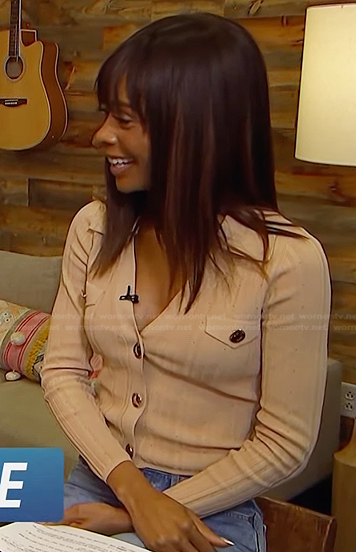 Zuri’s beige cardigan on Access Hollywood