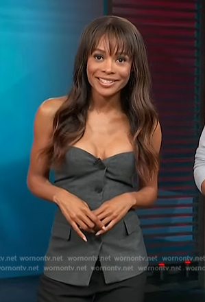 Zuri’s grey button down vest on Access Hollywood