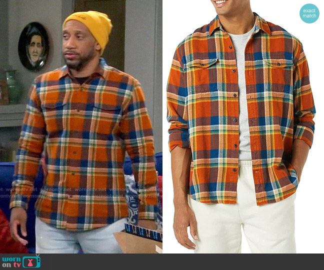 Amazon Essentials Regular-Fit Long-Sleeve Two-Pocket Flannel Shirt in Orange Navy Plaid worn by Trey (Malik S) on The Neighborhood