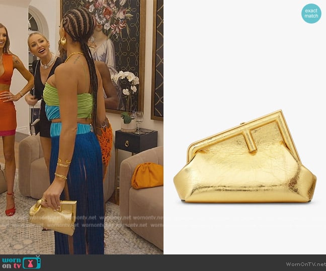 Fendi Gold Laminated Bag worn by Amanza Smith on Selling Sunset