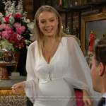 Abby’s white cape-sleeve mini dress on The Young and the Restless