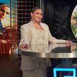 Adrienne’s beige asymmetric dress and blazer on E! News