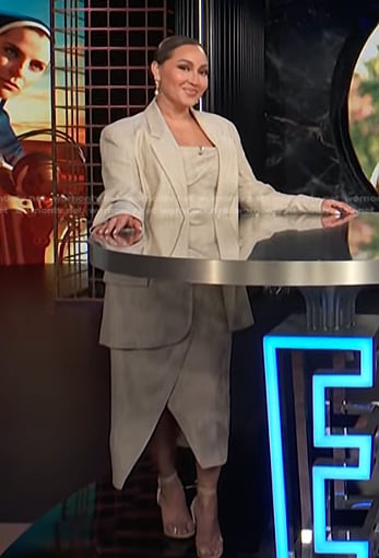 Adrienne’s beige asymmetric dress and blazer on E! News