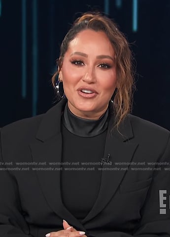 Adrienne’s black mock neck slit dress on E! News