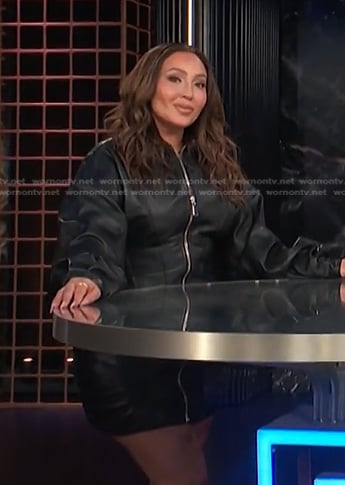 Adrienne’s black zip front dress on E! News