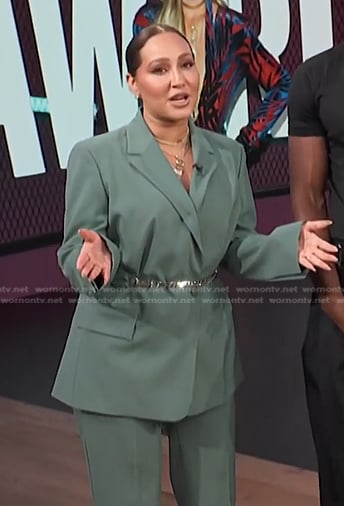 Adrienne's green chain belt blazer on E! News