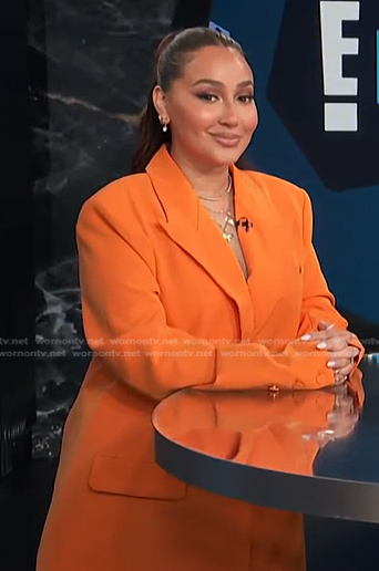 Adrienne's orange oversized blazer on E! News