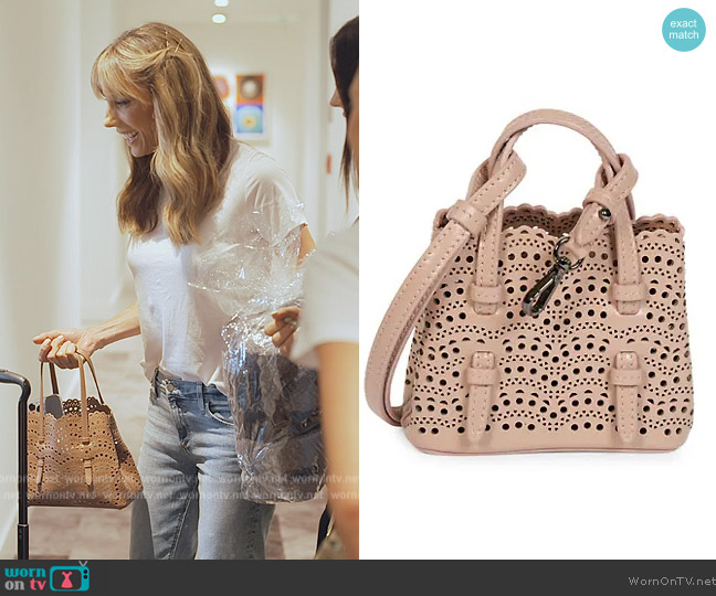 WornOnTV: Jennifer’s beige cutouts leather bag on The Family Stallone ...