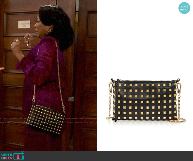 All Saints Eve Studded Leather Crossbody worn by Tina Butler (Tichina Arnold) on The Neighborhood