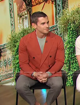 Antoni Porowski’s orange double breasted blazer on Access Hollywood