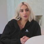 Kim’s black zip up hoodie on The Kardashians