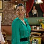 Audra’s green satin tassel tie dress and printed bag on The Young and the Restless