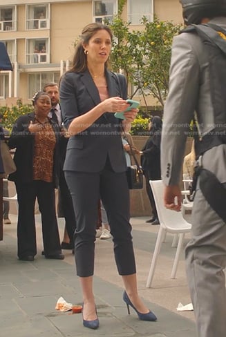 Blair Andrews’s navy elbow sleeve blazer and pants on 9-1-1