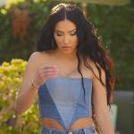 Bre’s denim crop top and jeans on Selling Sunset