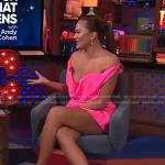 Chrissy Teigen’s pink draped mini dress on E! News