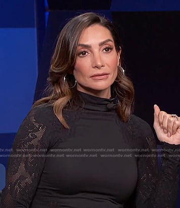 Courtney Lopez’s black mesh-sleeve top on E! News