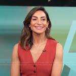 Courtney Lopez’s red vest on Access Hollywood