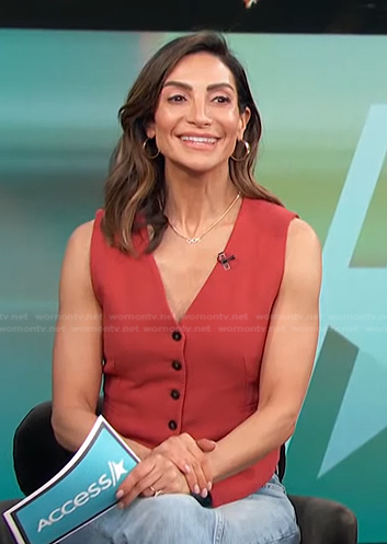 Courtney Lopez’s red vest on Access Hollywood