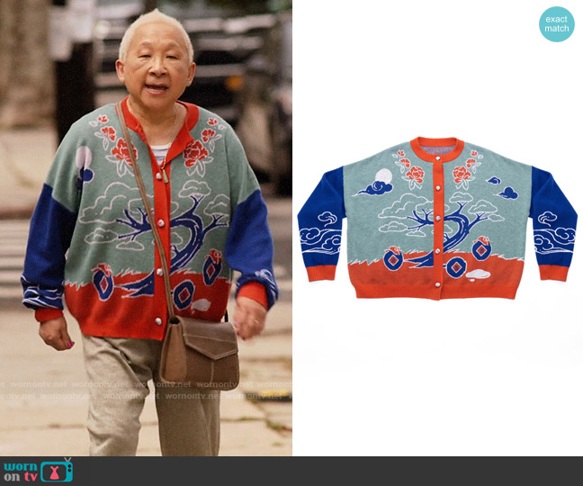 Grandma’s graphic print cardigan on Awkwafina is Nora From Queens